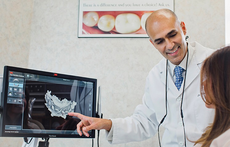 Dentist working with patient