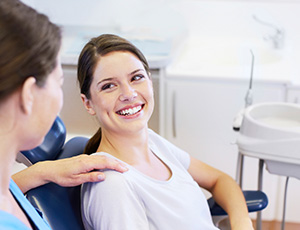 Smiling woman in dental chair