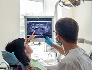 patient learning about advanced dental implant procedures in Herndon 