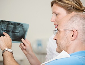 Patient listening to emergency dentist in Herndon