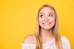 A young girl smiling