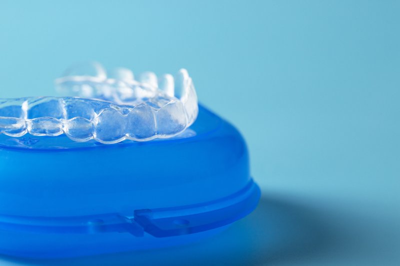 an Invisalign aligner and protective case