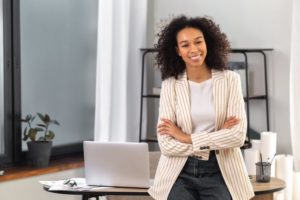 a woman smiling at work