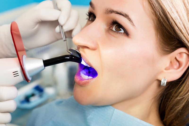 A woman getting a dental filling